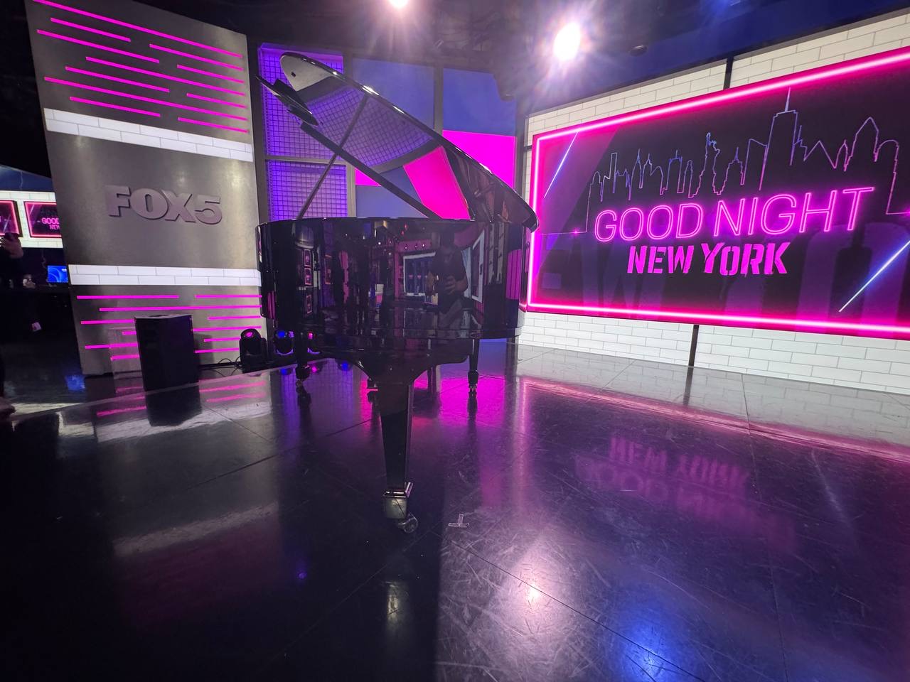 Grand piano on a television studio set